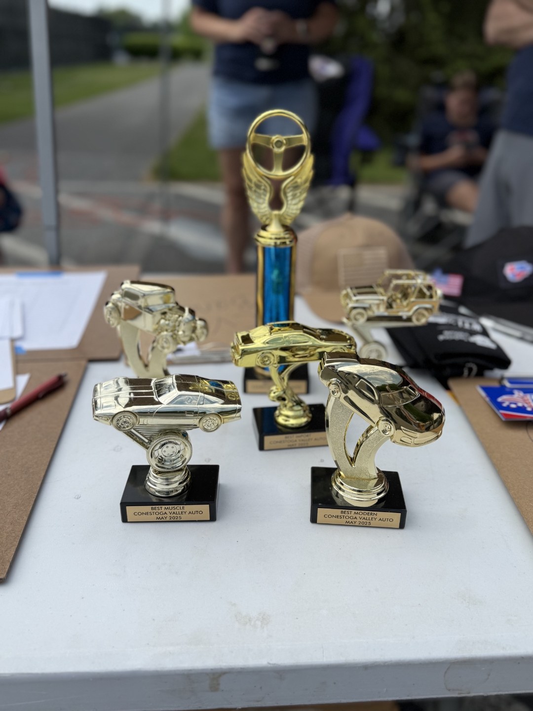 CVA-branded trophies at the car show